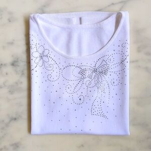 Front Floral Design of Rhinestones and Sparkles White Sleeveless Blouse.